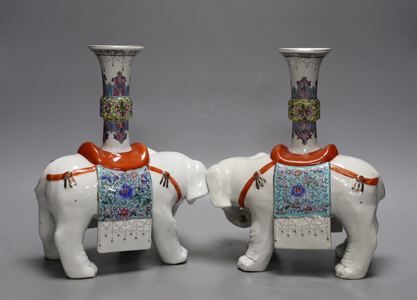 A pair of Chinese enamelled porcelain ‘elephant’ vases, 27cm high